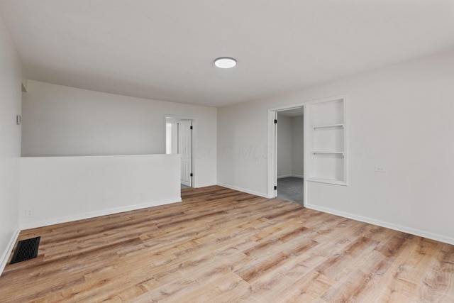 empty room featuring light hardwood / wood-style floors