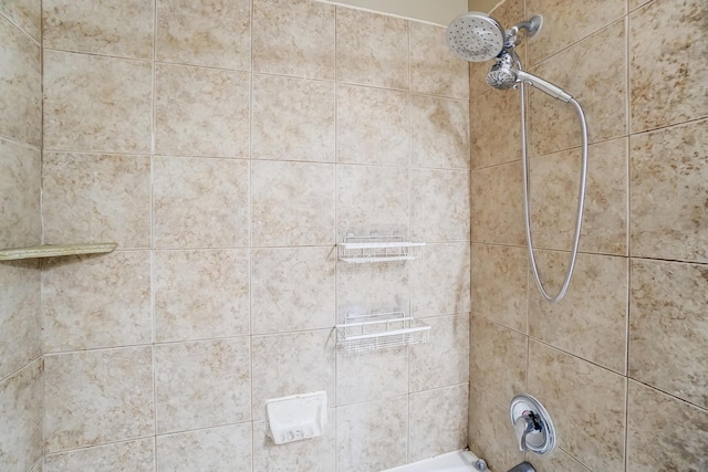 details with tiled shower / bath combo