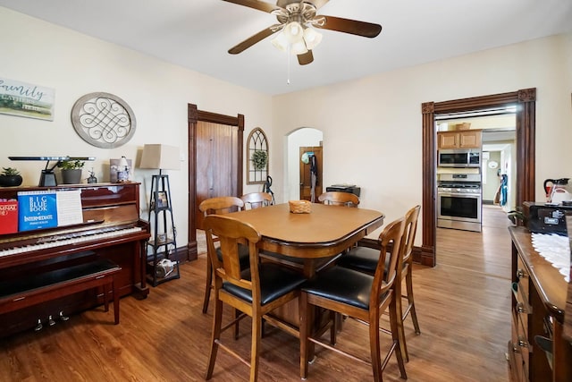 dining space featuring ceiling fan and light hardwood / wood-style flooring