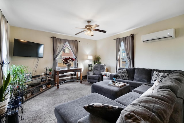 carpeted living room with a wall unit AC and ceiling fan