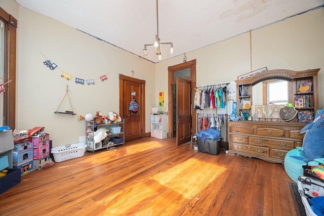 bedroom with wood finished floors