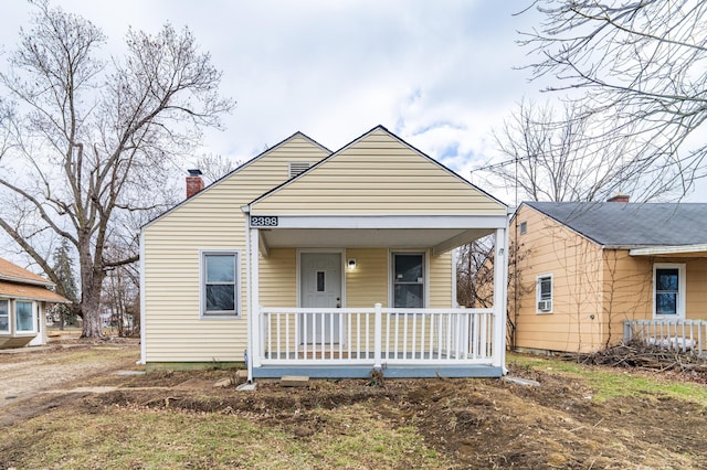 bungalow-style home featuring covered porch