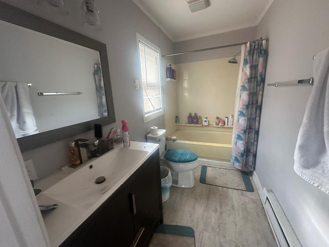 full bathroom with toilet, shower / tub combo, baseboard heating, vanity, and hardwood / wood-style flooring