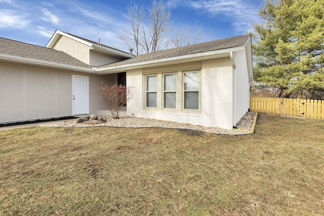 property entrance with a yard