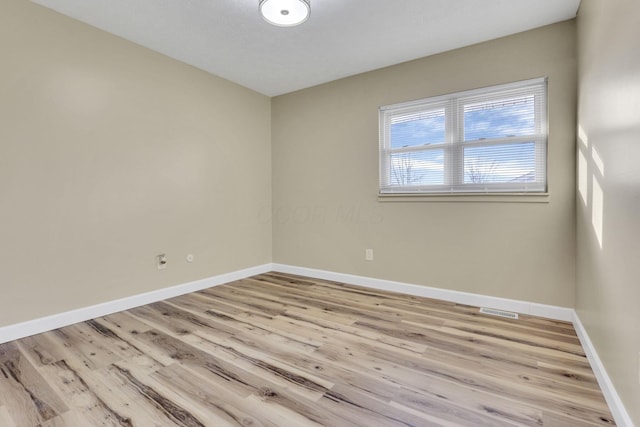 empty room featuring light hardwood / wood-style flooring