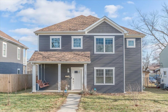 view of front of home featuring a porch, central AC, and a front yard