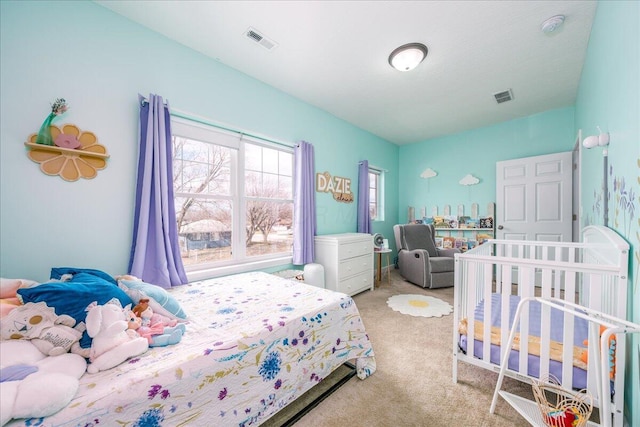 bedroom featuring light colored carpet