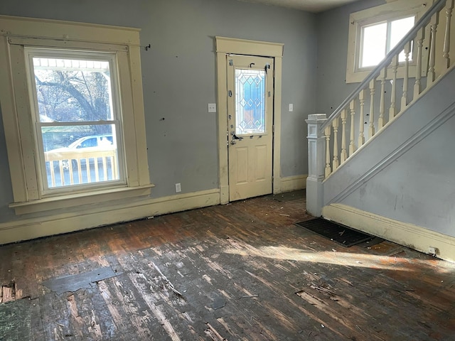 entrance foyer featuring dark hardwood / wood-style flooring