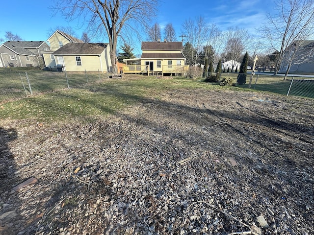 view of yard featuring a wooden deck