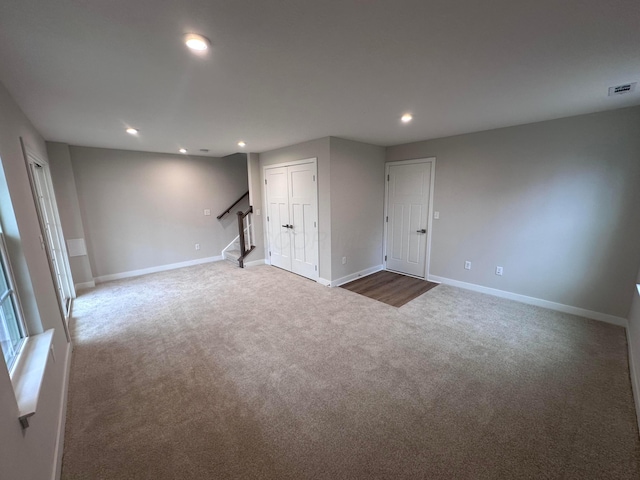 empty room with carpet flooring