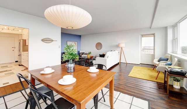 dining area featuring hardwood / wood-style floors