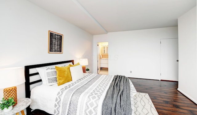 bedroom with dark wood-type flooring