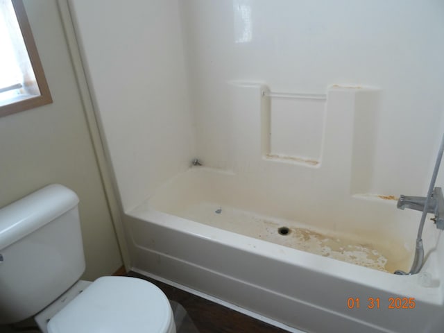 bathroom featuring toilet