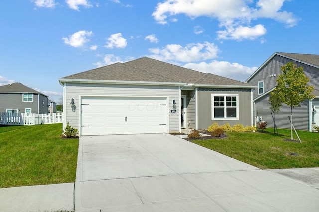 single story home with concrete driveway, roof with shingles, an attached garage, fence, and a front lawn