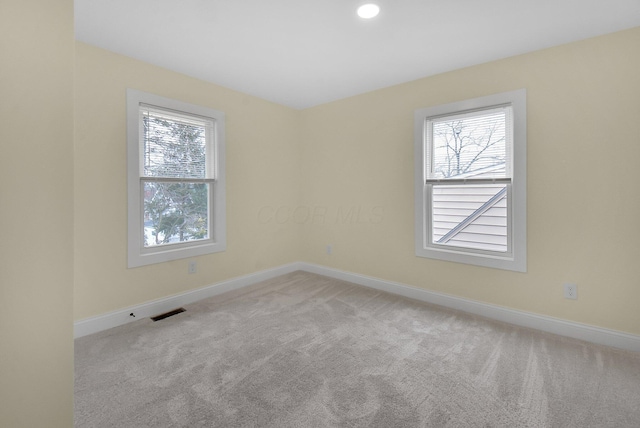 view of carpeted spare room