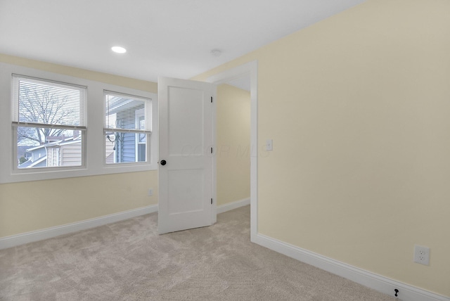 view of carpeted spare room