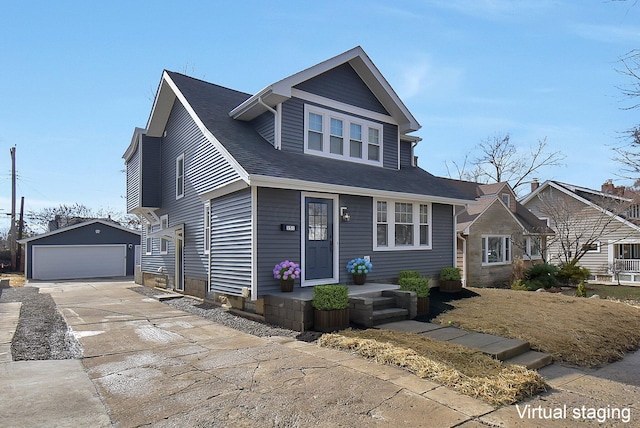 view of front of property with an outbuilding and a garage