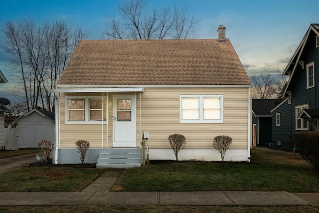 view of front of home with a front lawn