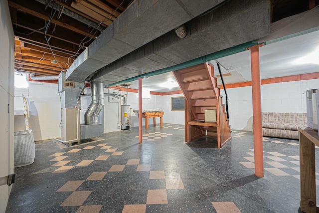 basement with heating unit and water heater