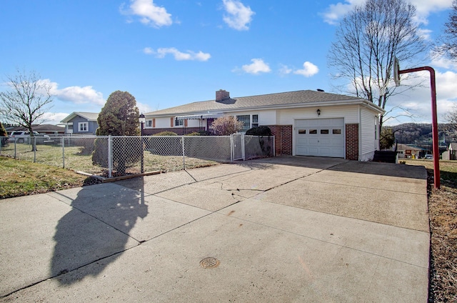 ranch-style house featuring a garage