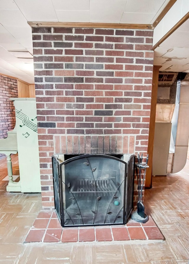 details with a brick fireplace