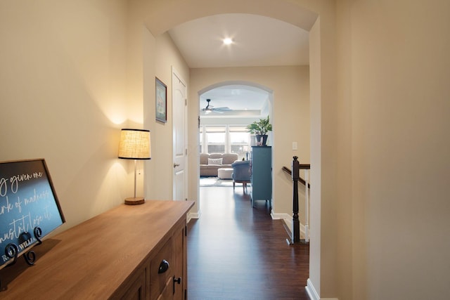 hall with dark wood-type flooring