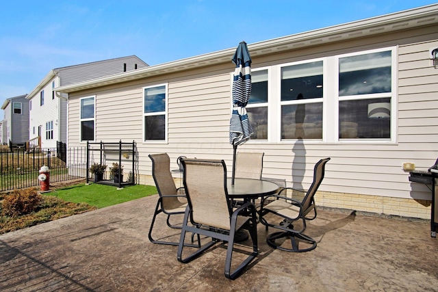 back of property featuring a patio