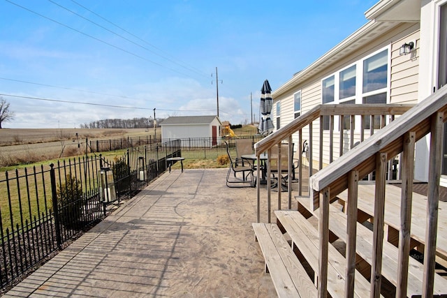 wooden terrace with a yard