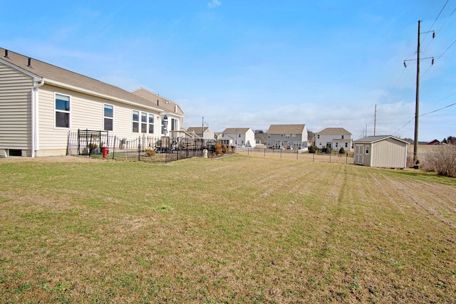 view of yard featuring a shed