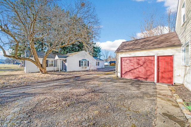 view of outbuilding featuring a garage