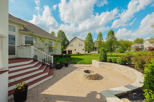 view of patio featuring a fire pit