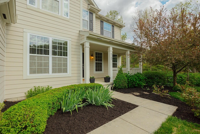 doorway to property with covered porch