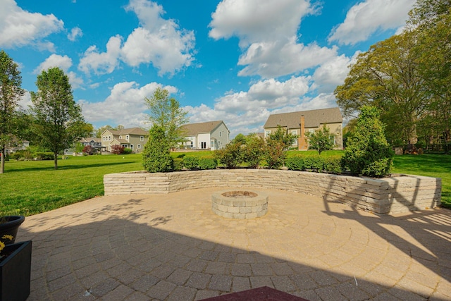 view of patio / terrace featuring a fire pit