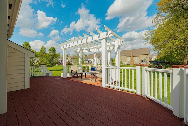 wooden deck featuring an outdoor living space, a pergola, and a yard