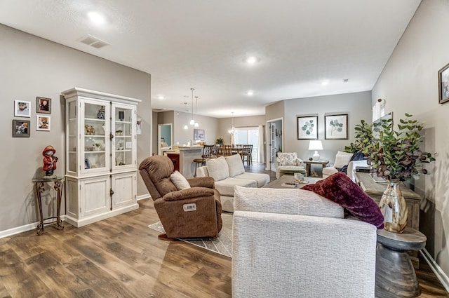 living room with dark hardwood / wood-style floors