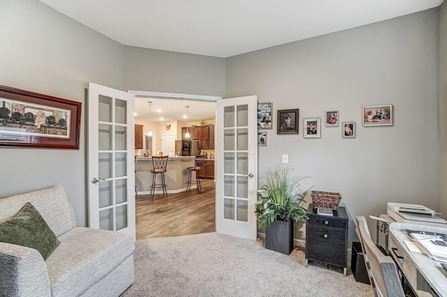 office area featuring carpet and french doors