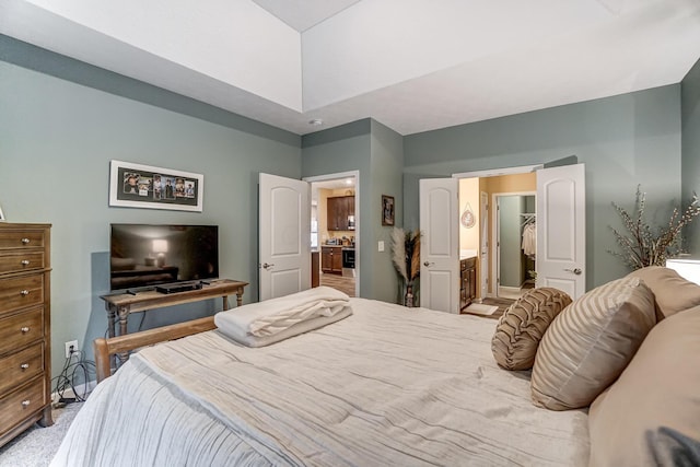 bedroom featuring a walk in closet and a closet