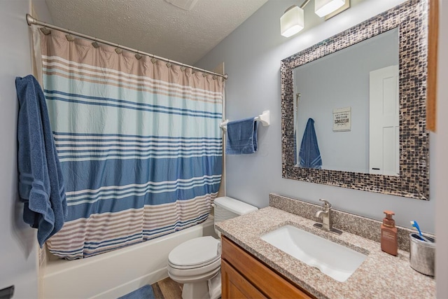 full bathroom with vanity, shower / bathtub combination with curtain, a textured ceiling, and toilet