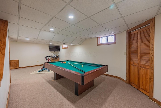 rec room with light carpet, a paneled ceiling, and billiards