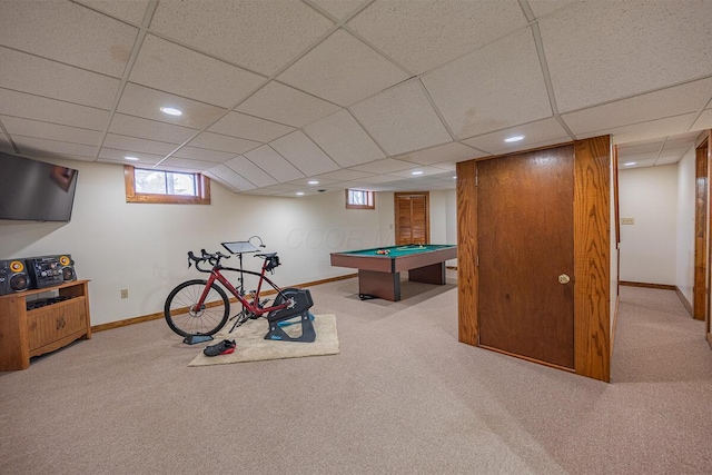 rec room featuring carpet flooring and a paneled ceiling