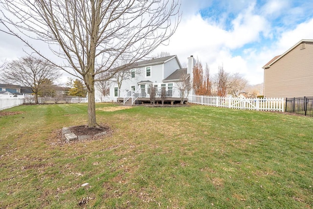 view of yard featuring a wooden deck