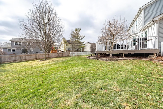 view of yard with a deck