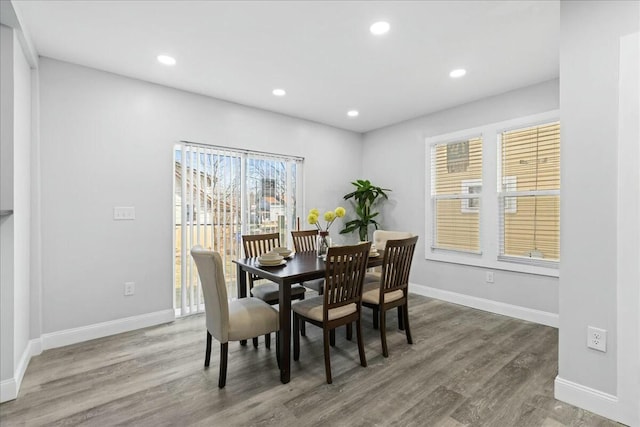 dining area featuring hardwood / wood-style flooring