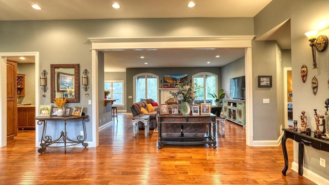 living room with light hardwood / wood-style flooring