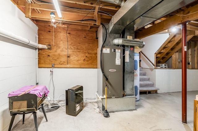 utility room featuring heating unit