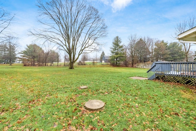 view of yard featuring a wooden deck