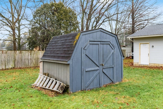 view of outdoor structure with a yard