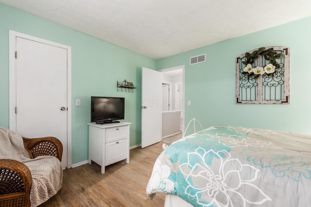 bedroom featuring light hardwood / wood-style flooring