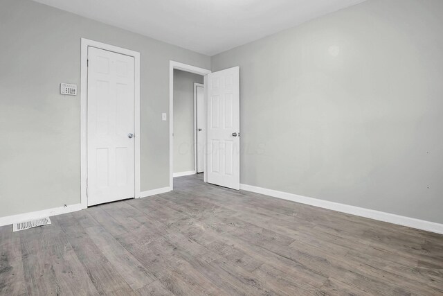 unfurnished bedroom with light hardwood / wood-style floors