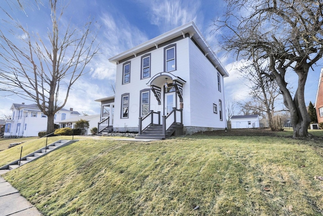 view of front of home with a front lawn